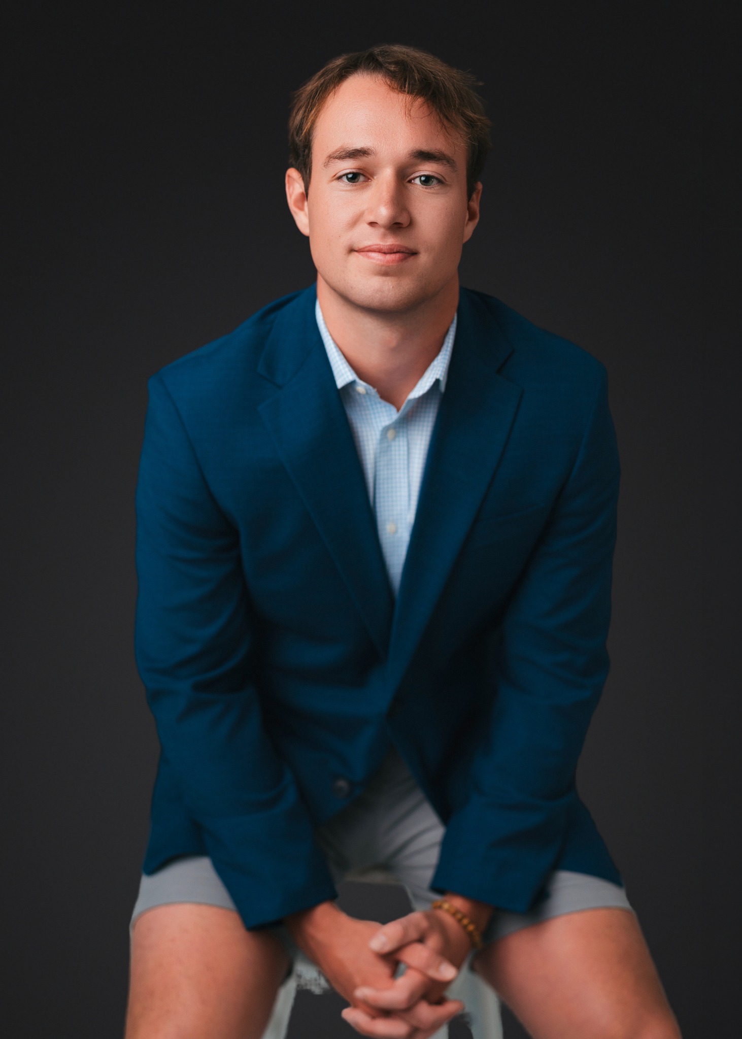 Professional portrait with dark background