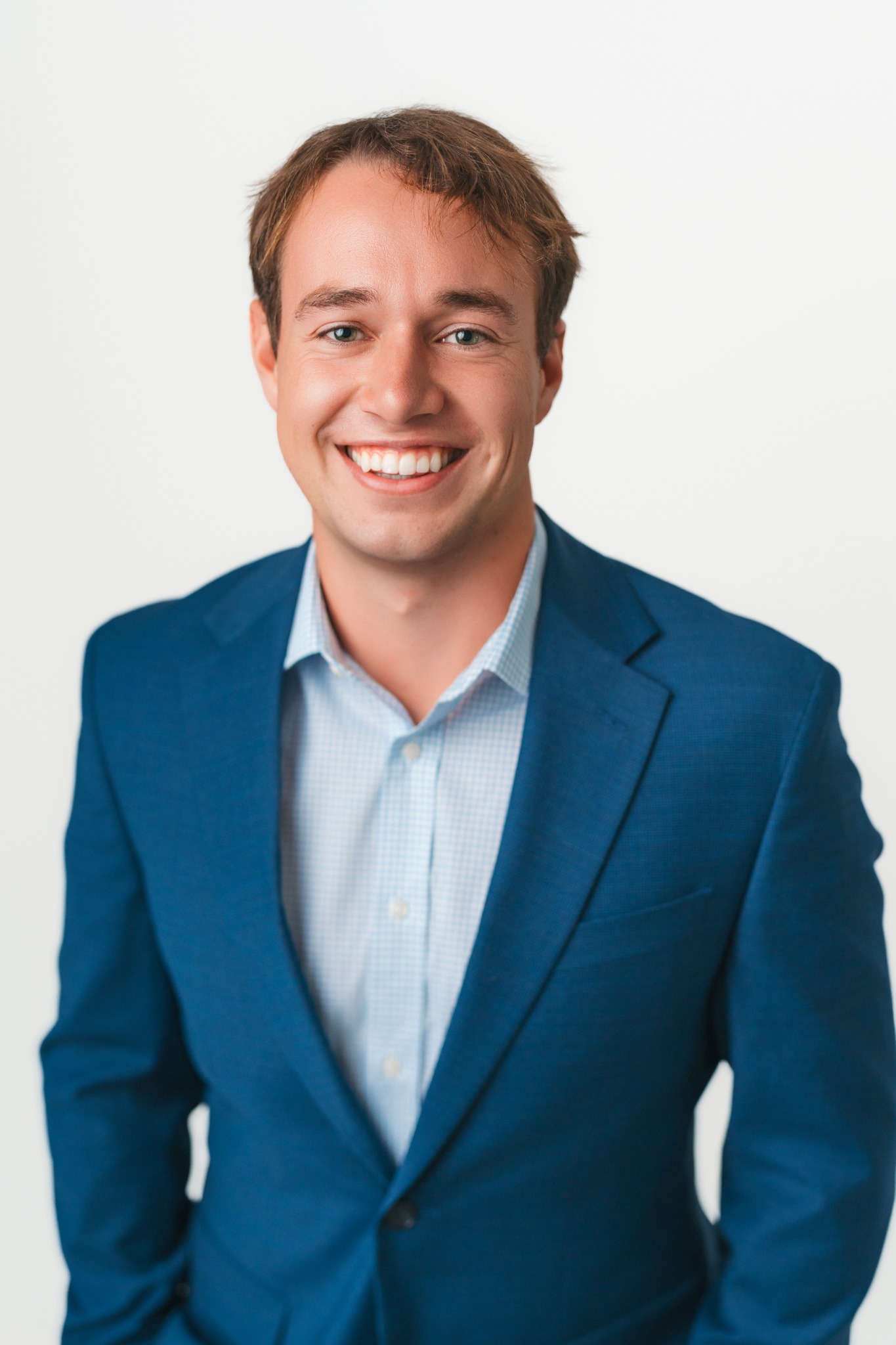 Professional headshot on a white background